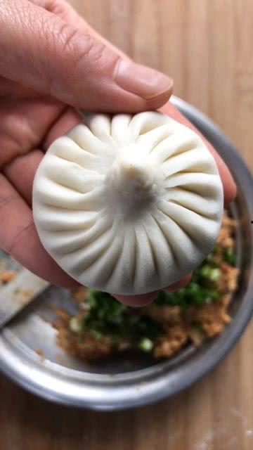 包包子的手法步骤视频,轻松掌握传统美食制作技巧